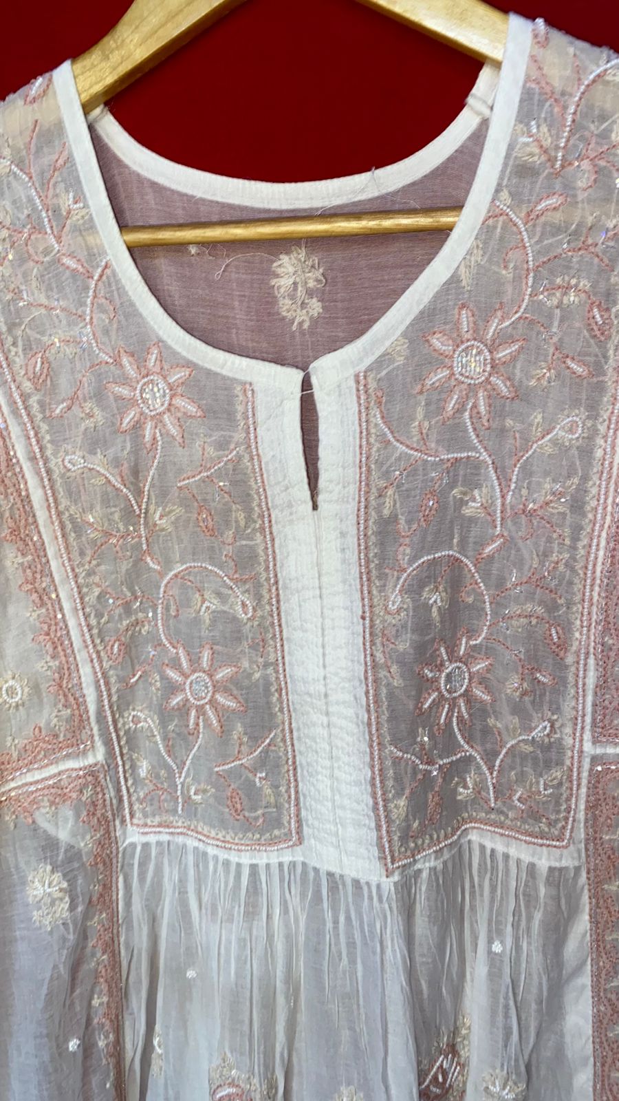 Elevate your ethnic wardrobe with this Pure Mul Chanderi semi-stitched gown featuring exquisite Chikankari embroidery and delicate pearl handwork. Paired with a graceful dupatta, this breathable and lightweight gown is perfect for festive occasions, weddings, and traditional gatherings. Customizable fit makes it ideal for all body types, blending comfort with elegance